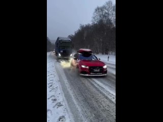 a full -wheel drive audi drags a whole truck. it's just incredible